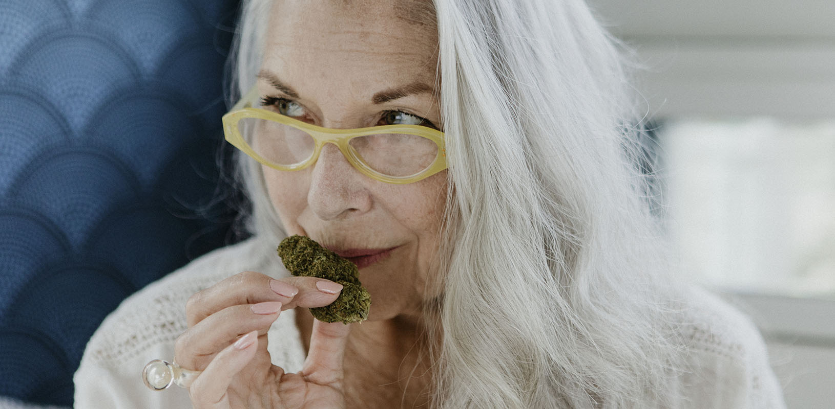 Mature woman eating cannabis edibles. What are terpenes? Buy weed in Ajax, Pickering.