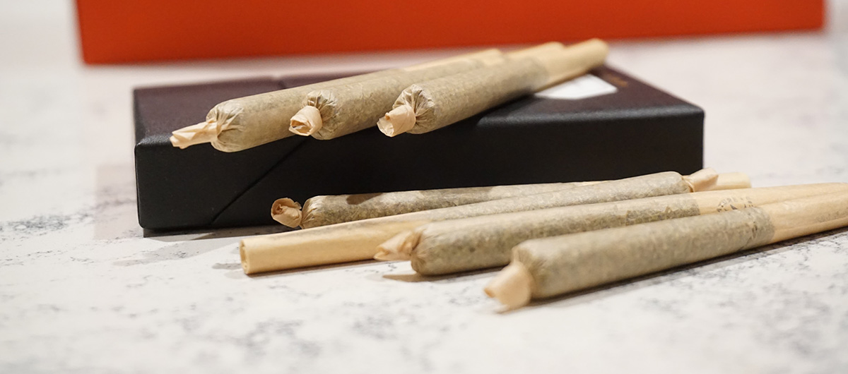 10 Facts You Need To Know About Pre-Rolled Joints 6 pre roll joints near a black