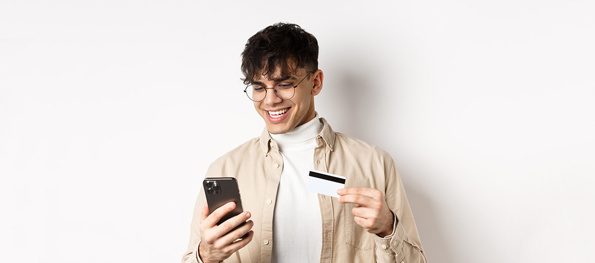 5 Fun Facts About Pre-Ground Weed 36 online shopping happy young man using smartphone to purchase online