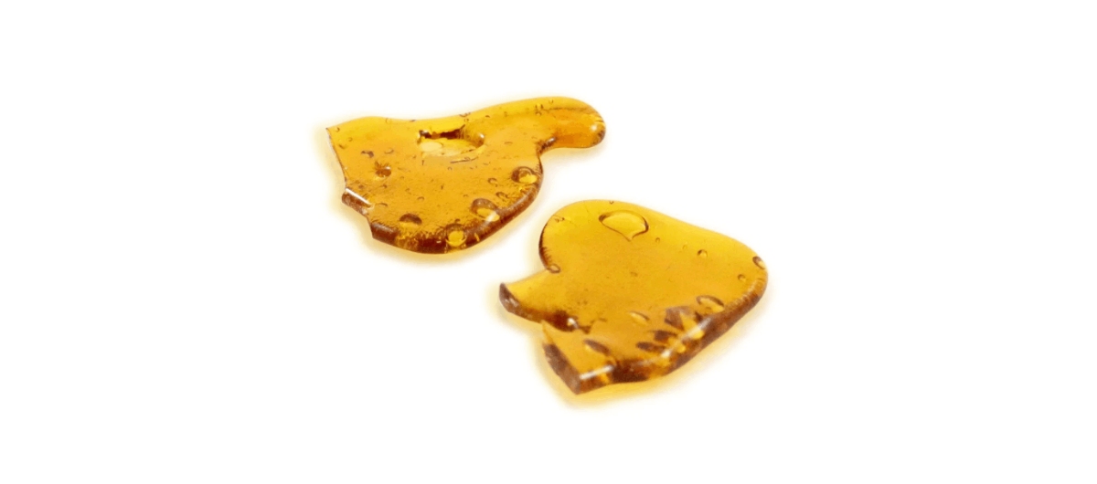 The 6ix Ajax dispensary features 8 Ball Kush Shatter | 1g made by extracting cannabinoids and terpenes from the resinous, rich trichomes of the 8 Ball Kush strain.